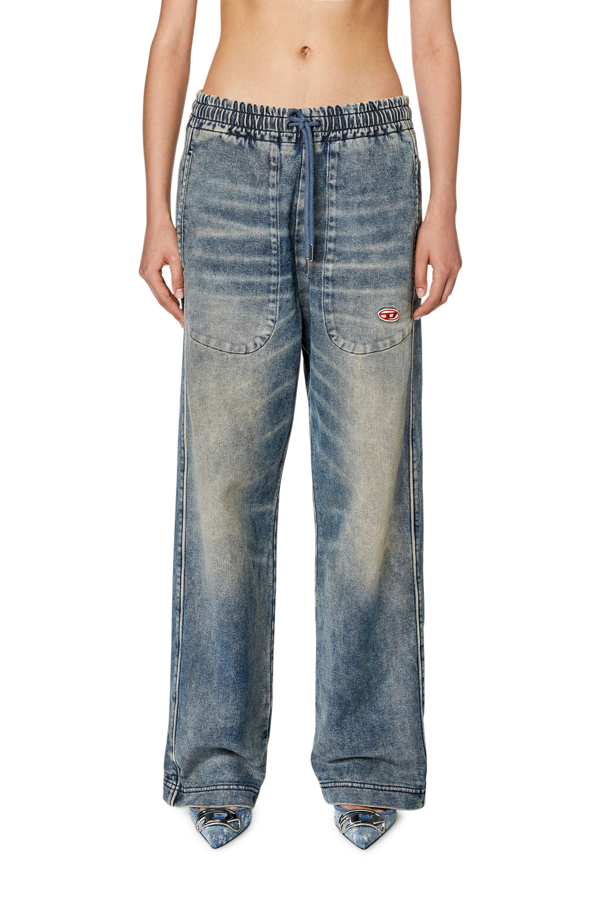 Distressed track hot sale denim jeans