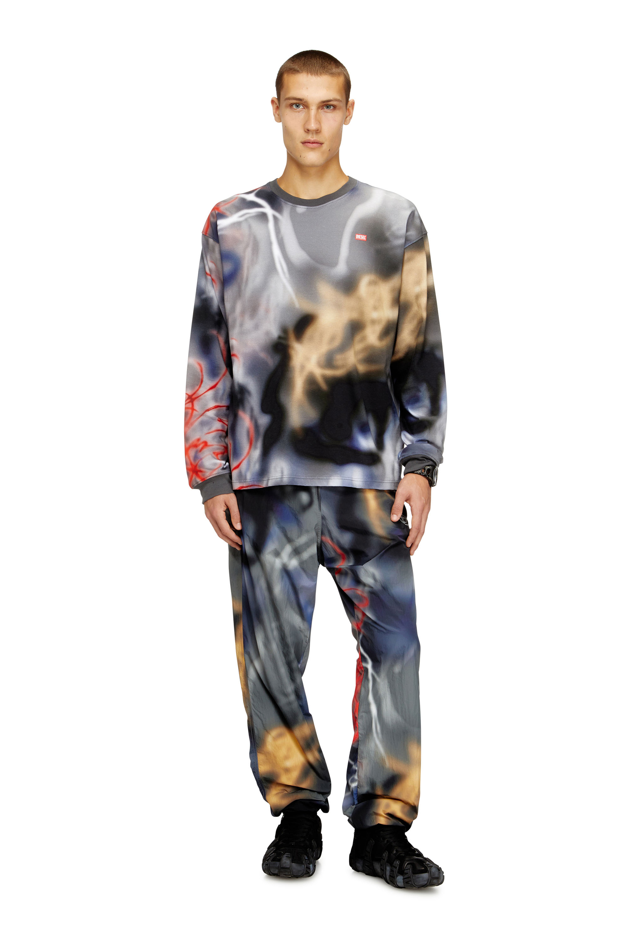 Diesel - P-ARELION, Man's Nylon pants with all-over print in Black/Blue - 2